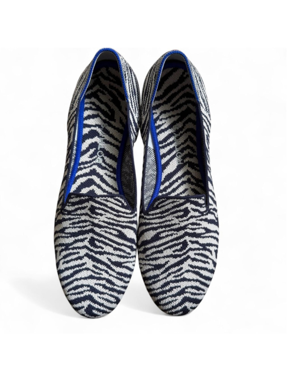 Rothy's The Almond Loafer white and blue zebra print slip-on flats
Retired desi
